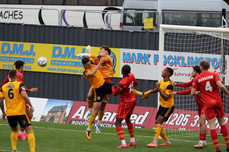 Gloucester goalkeeper with shirt colour clash