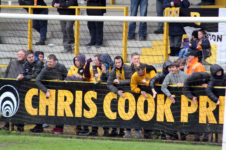 The Boston fans get ready for the penalty