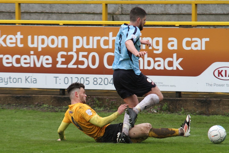 Reece Thompson slides in