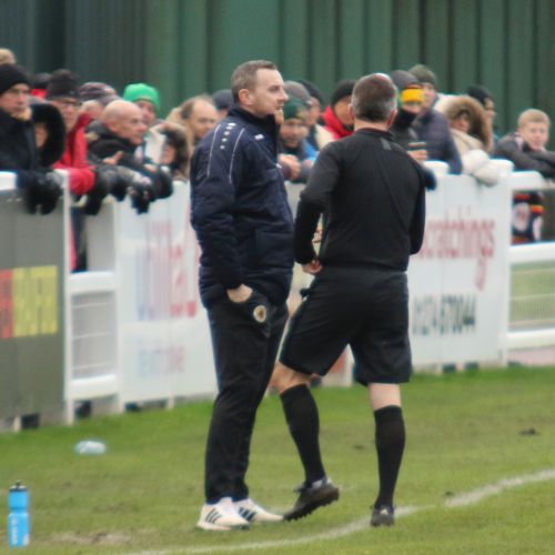 Craig Elliott listening to the referee