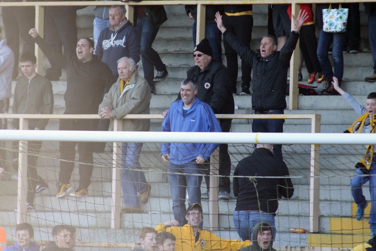 A rarity this season - smiles on the Town End on a Saturday afternoon