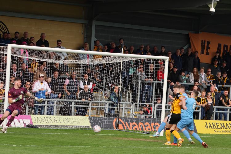 ... Jake Wright knocks in the rebound