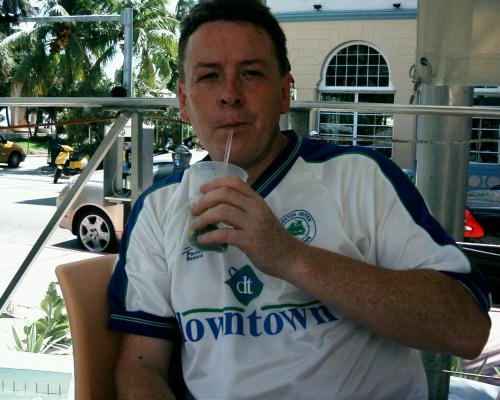 Ferret sipping a mojito on Ocean Drive, Miami