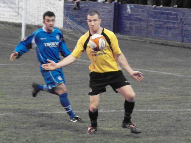 Jon Froggatt controls the ball