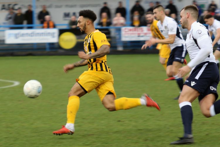 Jay Rollins breaks to score his first