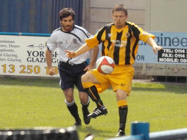 Mark Camm controls the ball