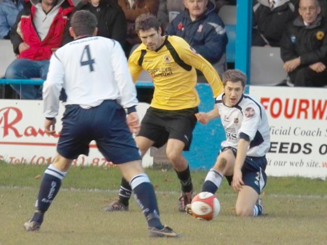 Ollie Ryan is tightly marked