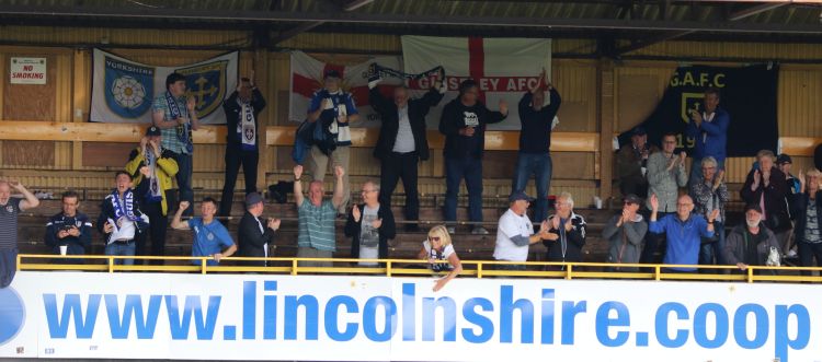 The Guiseley fans celebrate