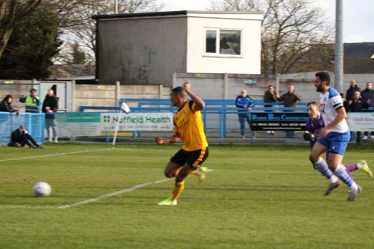 Danny Elliott rounds the keeper