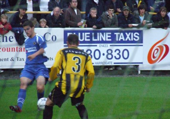 Tom Matthews fires in a cross