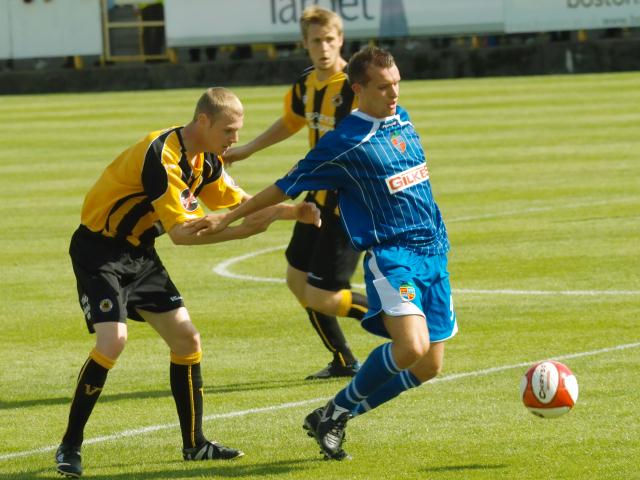 Chris Wood shadows his man