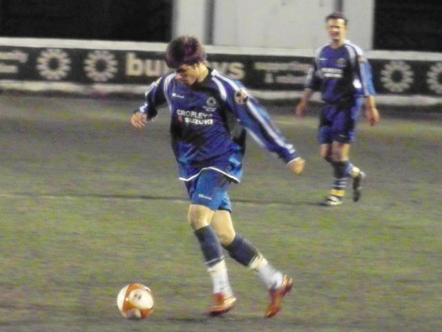 Gary King concentrates on the ball
