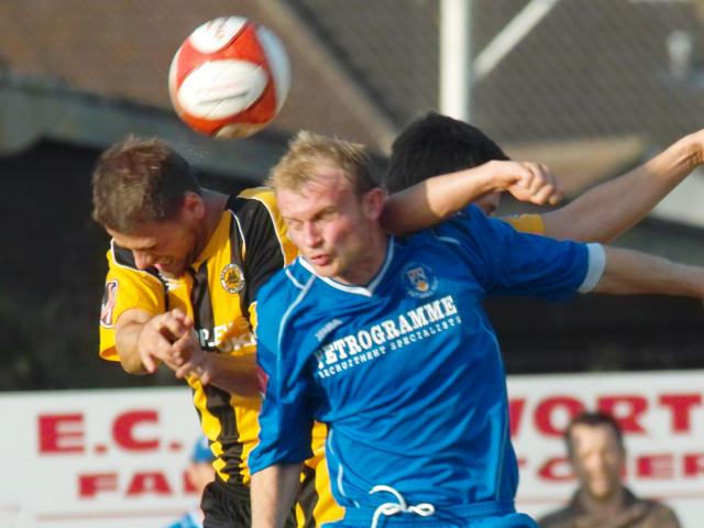 Liam Parker wins a header