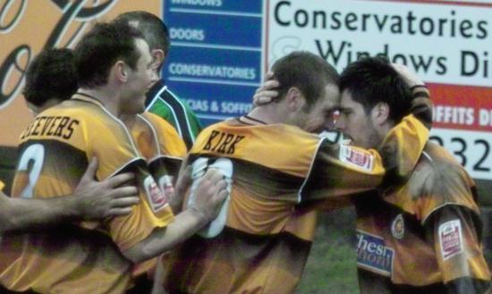 Celebrations after Clare's goal