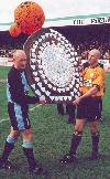 Bazza and Rennie lift the Shield