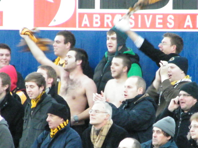 The Boston fans go wild after the goal