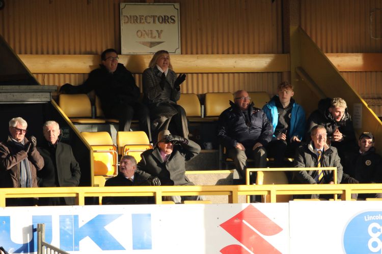 All smiles in the Directors' Box